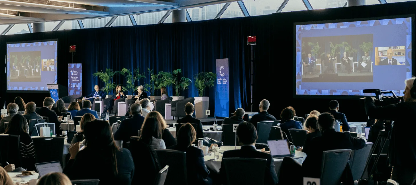 State of Canada's Cities Summit 2023 panel in background crowd photo